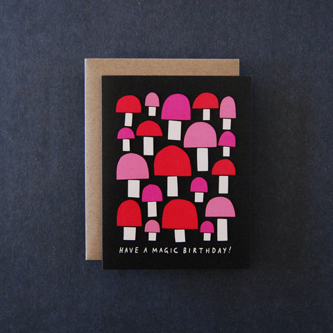 Greeting card with mushroom pattern and 'Have a Magic Birthday!' text on a dark background